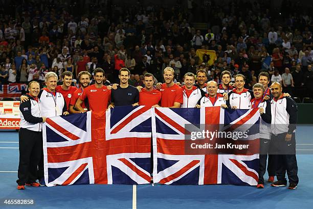 The victorious Aegon GB Davis Cup Team with players Andy Murray, James Ward, Jamie Murray and Dominic Inglot celebrate during day 3 of the Davis Cup...