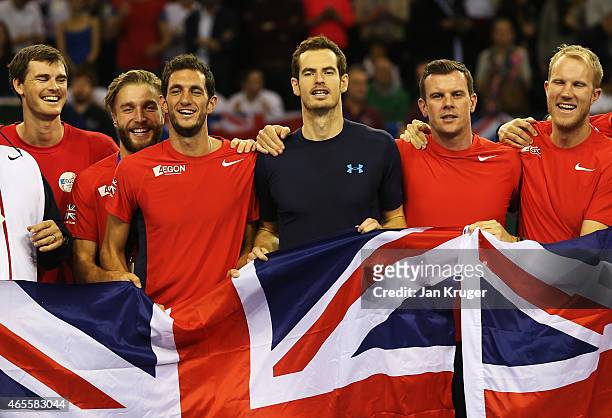 The victorious Aegon GB Davis Cup Team with players Andy Murray, James Ward, Jamie Murray and Dominic Inglot celebrate during day 3 of the Davis Cup...