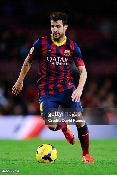 Cesc Fabregas of FC Barcelona runs with the ball during the La Liga match between FC Barcelona and Malaga CF at Camp Nou on January 26, 2014 in...