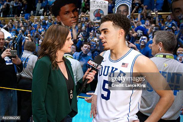 Sideline reporter Shannon Spake interviews Tyus Jones of the Duke Blue Devils following a game against the North Carolina Tar Heels at Cameron Indoor...
