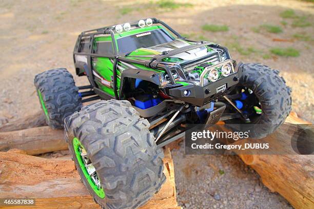 four-wheel drive remote controlled car - monster trucks stock pictures, royalty-free photos & images