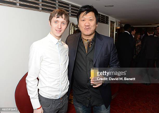 Alfie Oldman and Benedict Wong attend the 2014 Critics' Circle Theatre Awards at the Prince Of Wales Theatre on January 28, 2014 in London, England.