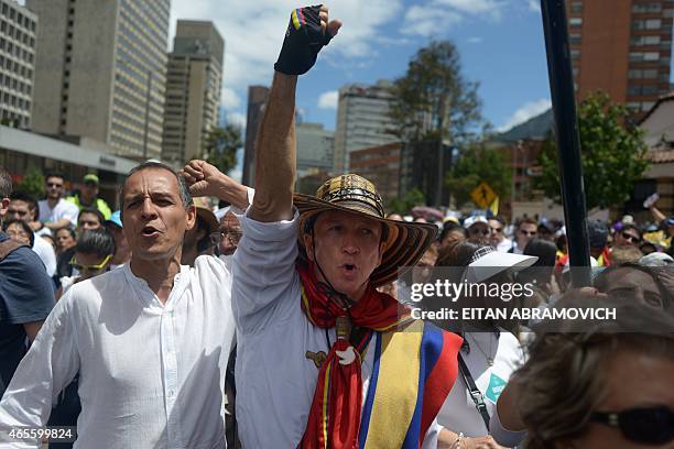People take part in the "March For Life", organized by Bogota's former Mayor Antanas Mockus, in Bogota, Colombia, on March 8, 2015. Thousands of...