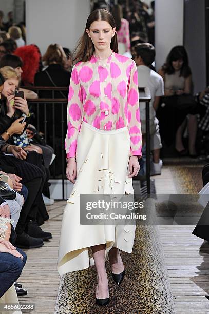 Model walks the runway at the Maison Rabih Kayrouz Autumn Winter 2015 fashion show during Paris Fashion Week on March 8, 2015 in Paris, France.