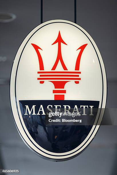 The Maserati SpA logo hangs on display at Louwman Exclusive Cars luxury automobile showroom in Utrecht, Netherlands, on Tuesday, Jan. 28, 2014....