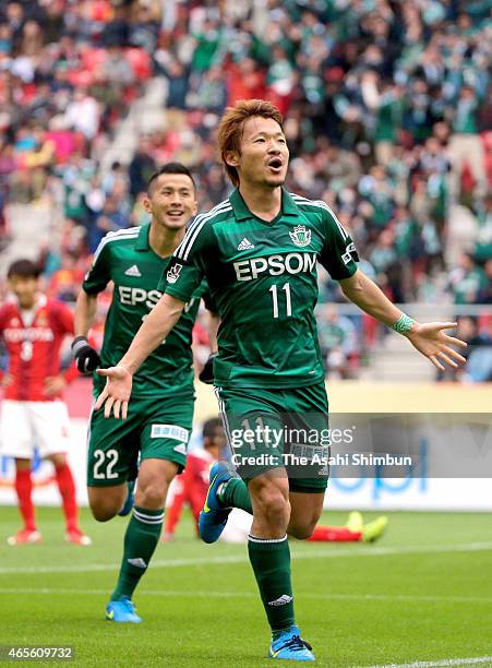 Kohei Kiyama of Matsumoto Yamaga celebrates scoring his team's third goal during the J.League match between Nagoya Grampus and Matsumoto Yamaga at...