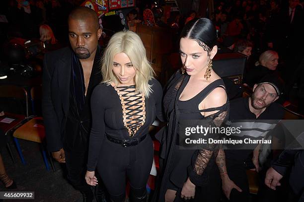 Johnny Wujek photobombs Kanye West, Kim Kardashian and Katy Perry as they attend the Givenchy show as part of the Paris Fashion Week Womenswear...