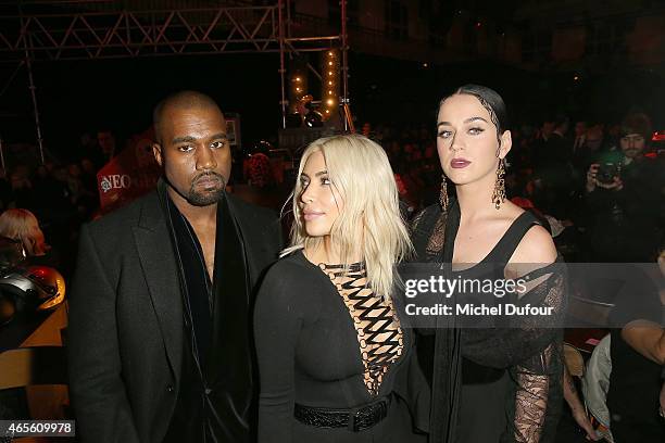 Kanye West, Kim Kardashian and Katy Perry attend the Givenchy show as part of the Paris Fashion Week Womenswear Fall/Winter 2015/2016 on March 8,...