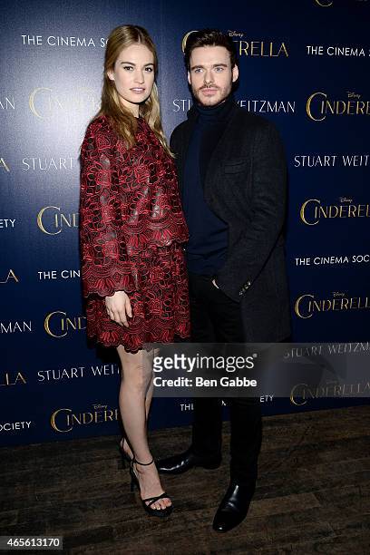 Actress Lily James and actor Richard Madden attend The Cinema Society & Stuart Weitzman Host A Special Screening Of Disney's "Cinderella" at Tribeca...