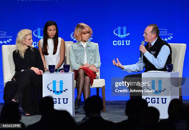 Maria Alekhina , Nadezhda Tolokonnikova of Pussy Riot and Paul Farmer attend Clinton Global Initiative University at University of Miami on March 7,...