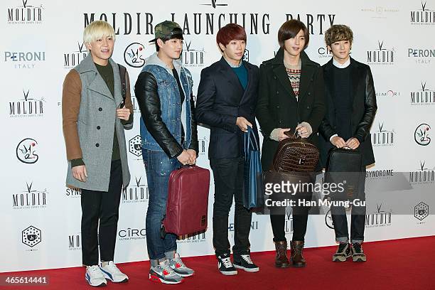 Members of South Korean boy band U-Kiss attend the Moldir Launching Party on January 24, 2014 in Seoul, South Korea.