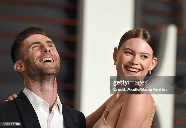 Model Behati Prinsloo and musician Adam Levine arrive at the 2015 Vanity Fair Oscar Party Hosted By Graydon Carter at Wallis Annenberg Center for the...