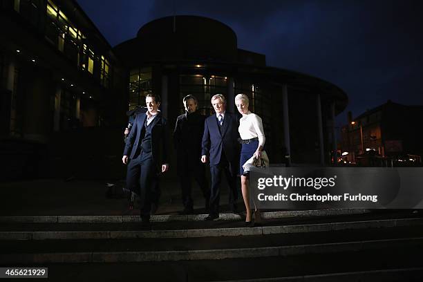 Actor William Roache leaves Preston Crown Court with his children James Roache, Linus Roache and Verity Roache as they attend his trial over...