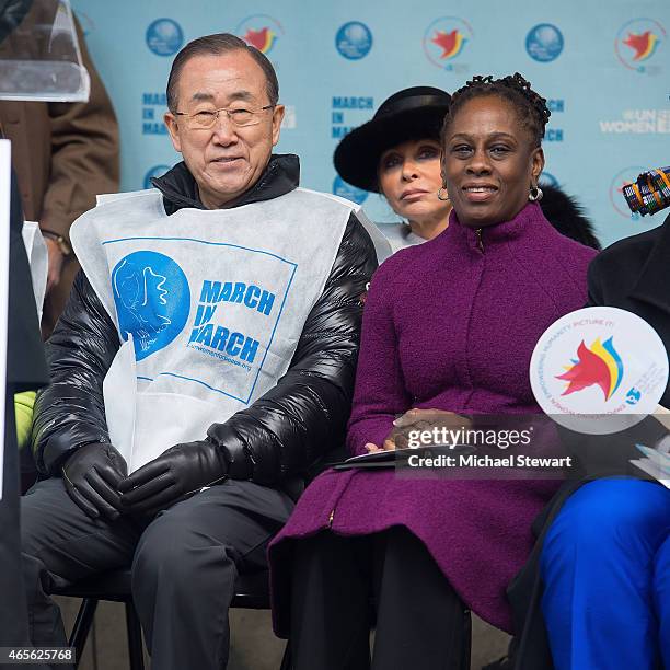 United Nations Secretary-General Ban Ki-moon and Chirlane McCray attend the 2015 International Women's Day March at Dag Hammarskjold Plaza on March...