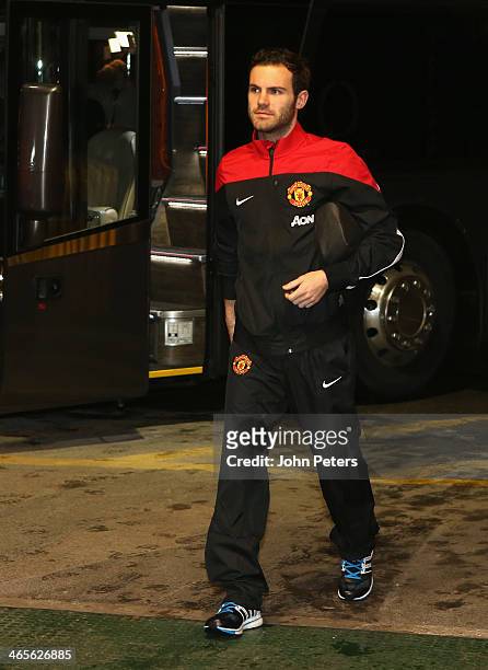 Juan Mata of Manchester United arrives at Old Trafford ahead of the Barclays Premier League match between Manchester United and Cardiff City at Old...