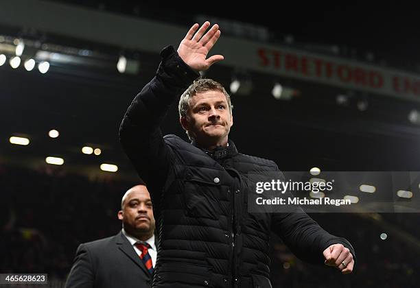 Cardiff City Manager Ole Gunnar Solskjaer salutes the crowd prior to the Barclays Premier League match between Manchester United and Cardiff City at...