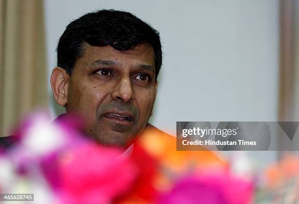 Governor Raghuram Rajan during the announcement of RBI monetary policy at RBI Headquarters on January 28, 2013 in Mumbai, India. In a surprise move,...