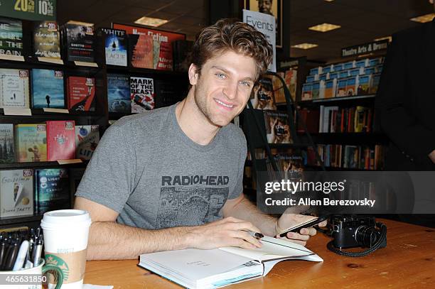 Actor Keegan Allen signs his book "life.love.beauty" at Barnes & Noble on March 8, 2015 in Huntington Beach, California.