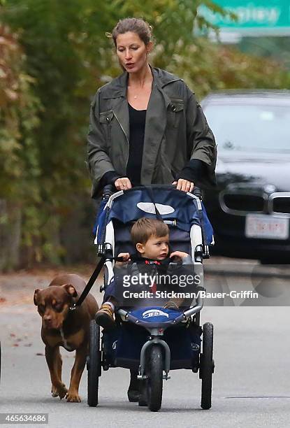 Gisele Bundchen and her son Benjamin Rein Brady are seen walking her dog Lua on September 22, 2012 in Boston, Massachusetts.