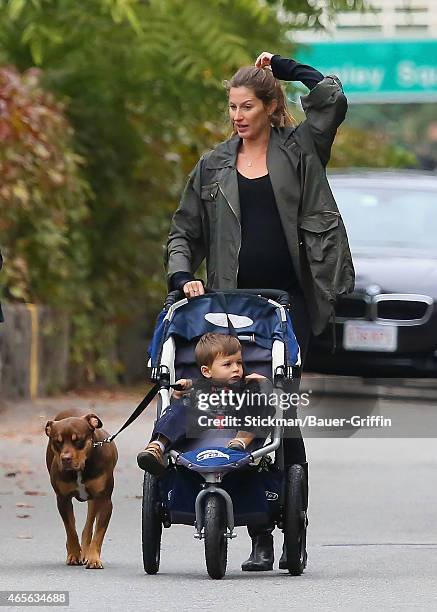 Gisele Bundchen and her son Benjamin Rein Brady are seen walking her dog Lua on September 22, 2012 in Boston, Massachusetts.