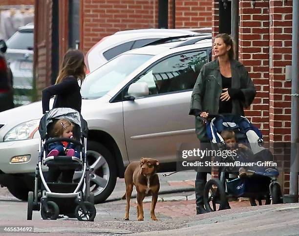 Gisele Bundchen and her son Benjamin Rein Brady are seen walking her dog Lua on September 22, 2012 in Boston, Massachusetts.