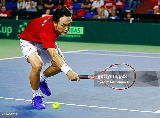 Go Soeda of Japan misses a shot against Vasek Pospisil of Canada during their Davis Cup match March 8, 2015 in Vancouver, British Columbia, Canada....