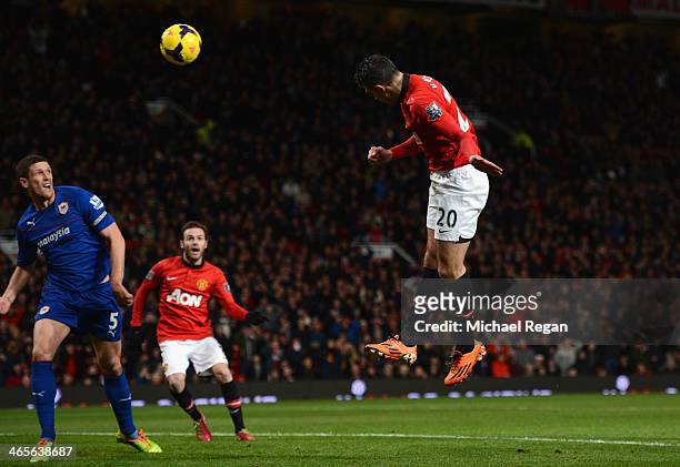 Robin van Persie of Manchester United scores the opening goal during the Barclays Premier League match between Manchester United and Cardiff City at...