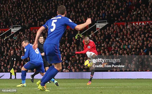 Ashley Young of Manchester United scores their second goal during the Barclays Premier League match between Manchester United and Cardiff City at Old...