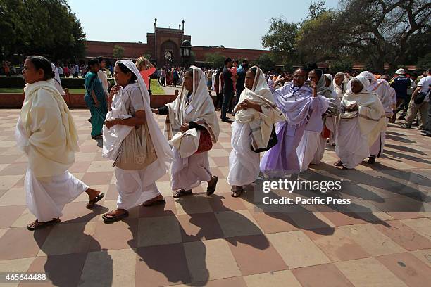 Group of widows from Varanasi and Vrindavan to visit Taj Mahal to celebrate the International Women's Day in Agra. International Women's Day is...