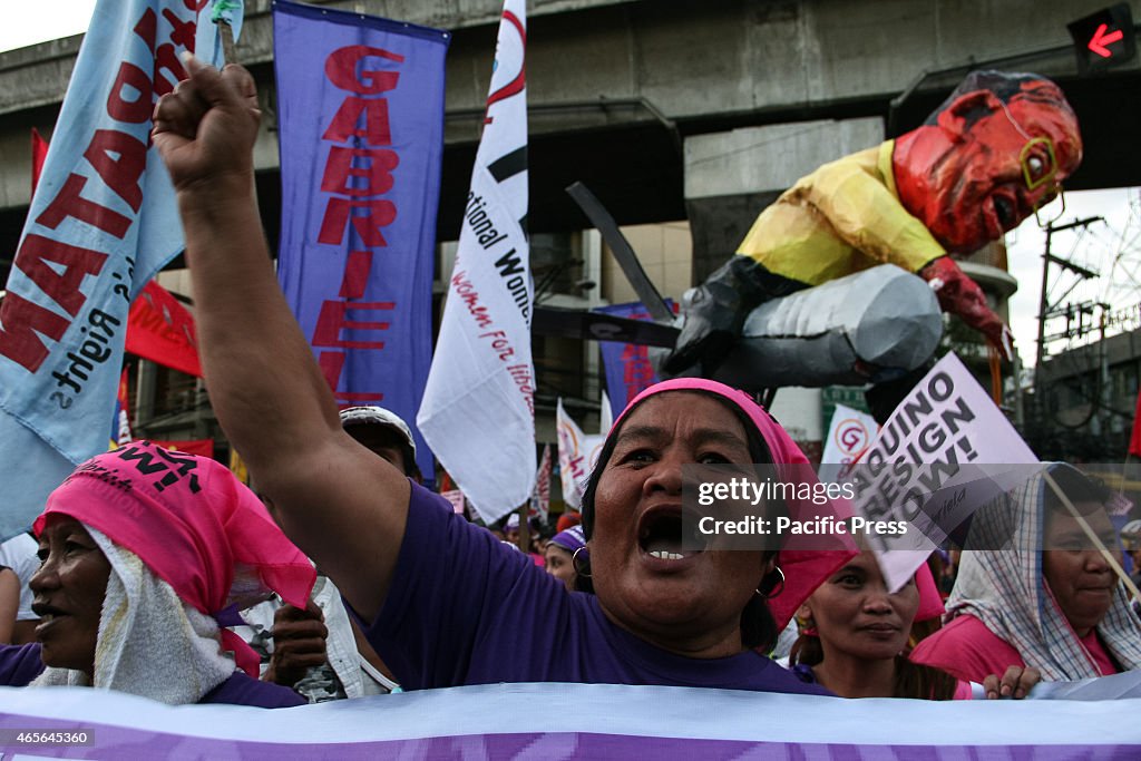 A protester shouts her grievances during the International...