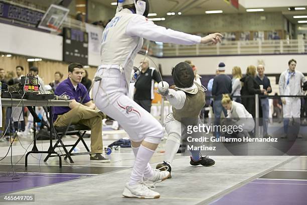 Fencing Invitational: Ohio State Eleanor Harvey in action vs Columbia Nzingha Prescod during tournament at Coles Sports and Recreation Center....