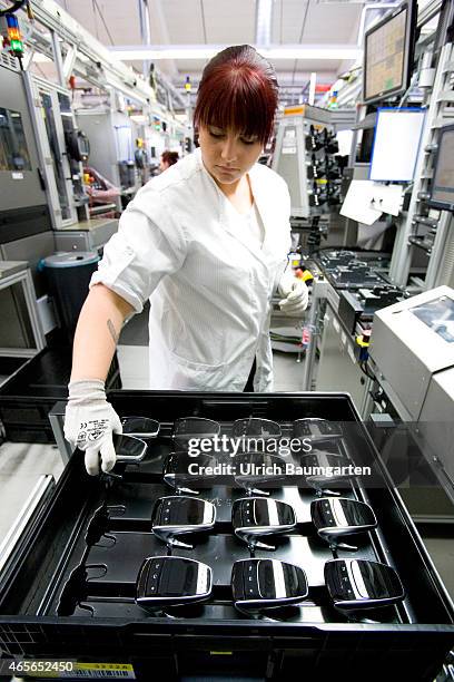 Production of modern touchpads for cars at Continental AG in Babenhausen.