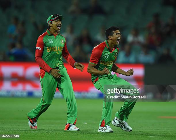 Taskin Ahmed of Bangladesh celebrates with team-mate Soumya Sarkar after taking the wicket of James Taylor of England during the 2015 ICC Cricket...