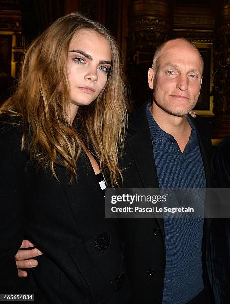 Cara Delevingne and Woody Harrelson attend the Stella McCartney show as part of the Paris Fashion Week Womenswear Fall/Winter 2015/2016 on March 9,...