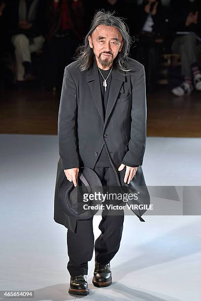 Designer Yohji Yamamoto walks the runway during the Yohji Yamamoto show as part of the Paris Fashion Week Womenswear Fall/Winter 2015/2016 on March...