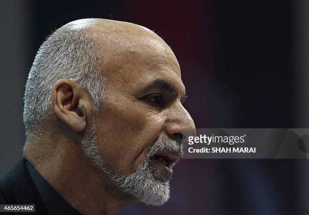 Afghan President Ashraf Ghani speaks during a ceremony to mark the first anniversary of the death of former Afghan vice president Mohammad Qasim...