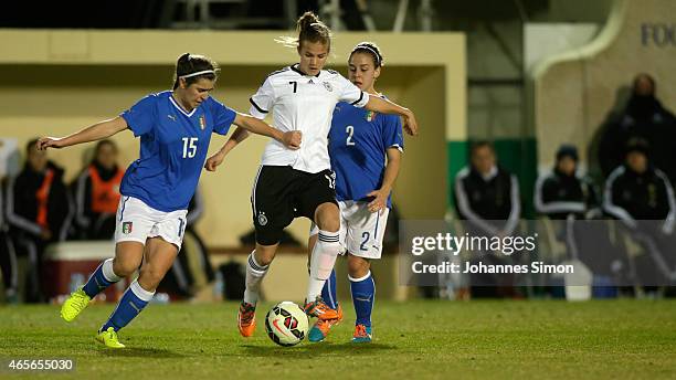 Anna Gasper of Germany and Valentina Bergamaschi and Lisa Boattin of Italy fight for the ball during the women's U19 international friendly match...