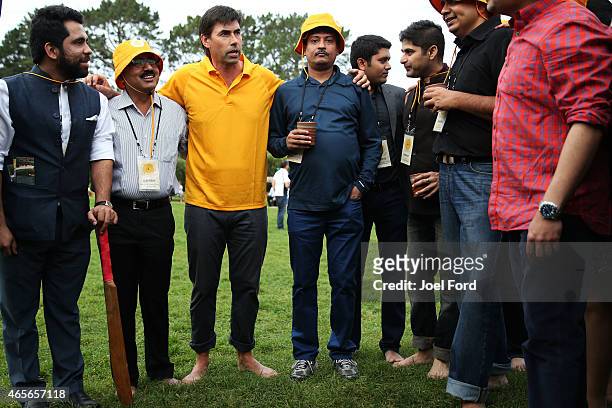 Stephen Fleming gives a pep talk to his team during a backyard cricket match, captained by Kiwi cricket greats Sir Richard Hadlee and Stephen...