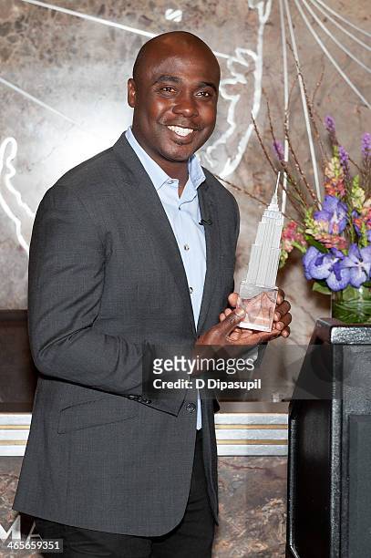National Football League Hall of Fame running back Marshall Faulk lights The Empire State Building on January 28, 2014 in New York City.