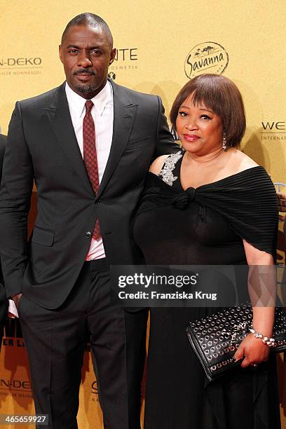 Idris Elba and Zindzi Mandela attend the premiere of the film 'Mandela: Long Walk to Freedom' at Zoo Palast on January 28, 2014 in Berlin, Germany.