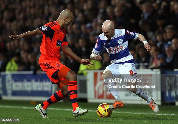 Andrew Johnson of QPR taks on Alex Baptiste of Bolton in action during the Sky Bet Championship match between Queens Park Rangers and Bolton...