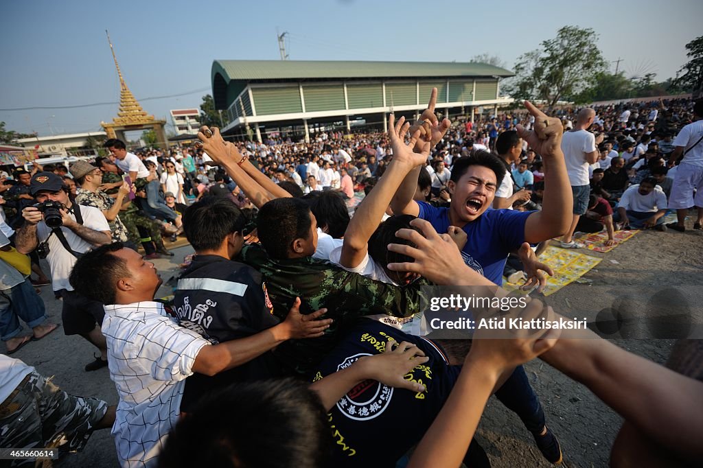 Thai devotees in trance by the spirits of the magical tattoo