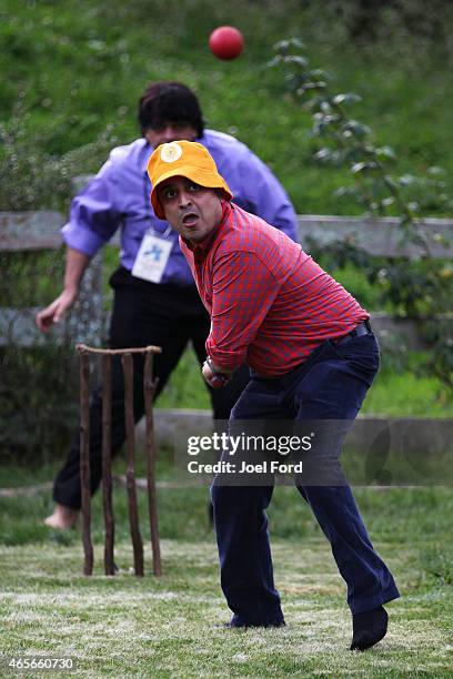 Guests play backyard cricket, captained by Kiwi cricket greats Sir Richard Hadlee and Stephen Fleming, - under the famed 'party tree' at Hobbiton...