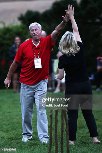 Sir Richard Hadlee celebrates with a teammate during a backyard cricket match, captained by Kiwi cricket greats Sir Richard Hadlee and Stephen...