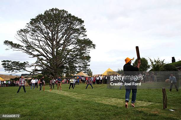 Guests play backyard cricket, captained by Kiwi cricket greats Sir Richard Hadlee and Stephen Fleming, - under the famed 'party tree' at Hobbiton...