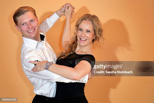 Paul Lorenz and Katja Burkard pose at a photo call for the television competition 'Let's Dance' on March 9, 2015 in Cologne, Germany. On March 13th,...