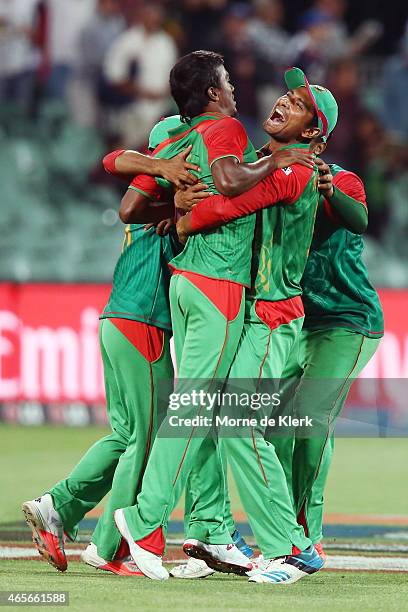 Bangladesh players celebrate after winning the 2015 ICC Cricket World Cup match between England and Bangladesh at Adelaide Oval on March 9, 2015 in...