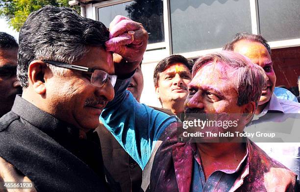 Ravi Shankar Prasad with Satish Upadhyay during BJP Holi Milan at Delhi BJP office in New Delhi.