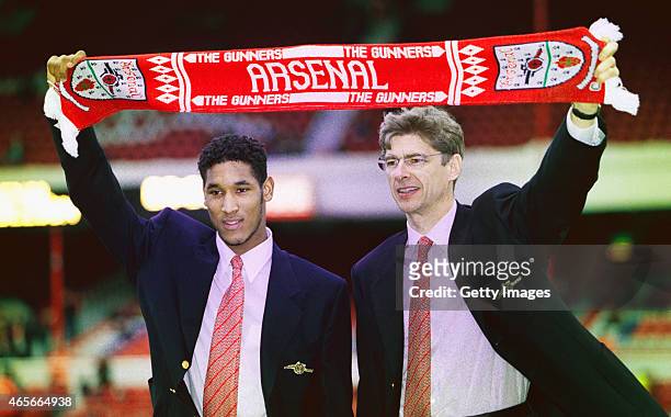 Arsenal manager Arsene Wenger and new signing Nicolas Anelka pictured before an FA Carling Premiership match between Arsenal and Wimbledon at...