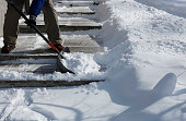 Winter blizzard: Cleaning the stairway